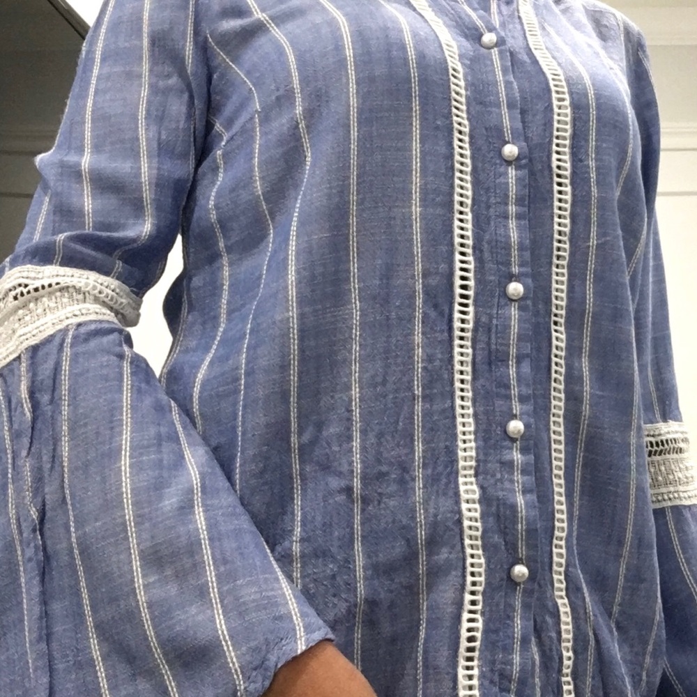 Light blue blouse with long sleeves